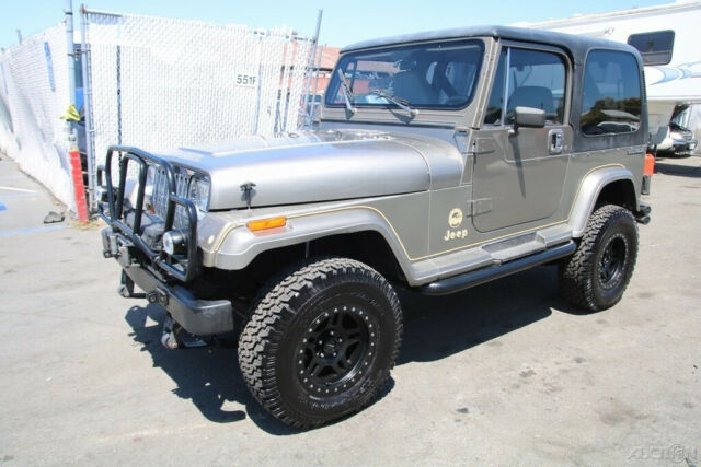 (c) 1990 jeep wrangler sahara 5-speed manual 6 cylinder no reserve