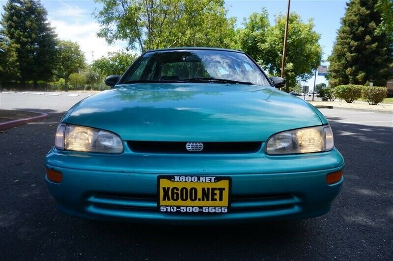 geo prizm 80000 miles polynesian green metallic with 81,716 miles, for sale!