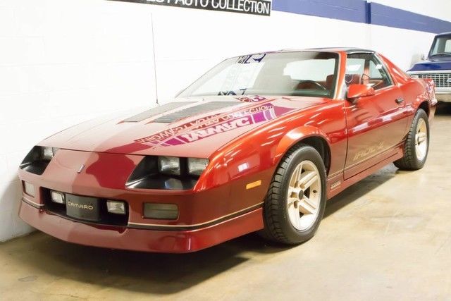t-tops~iroc package~southern car~v8~gold wheels~