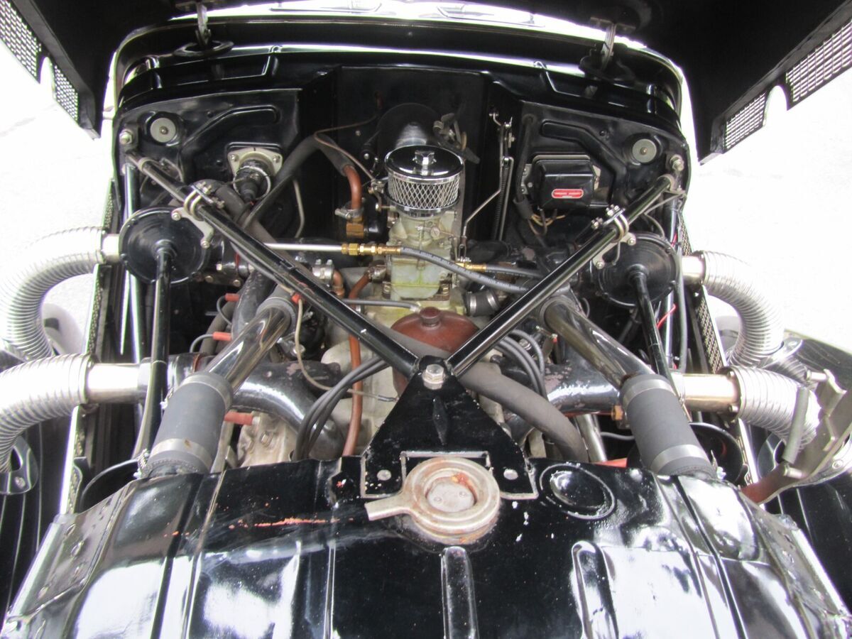 black, red leather. paint + leather restored, engine + carburetor re-built. runs