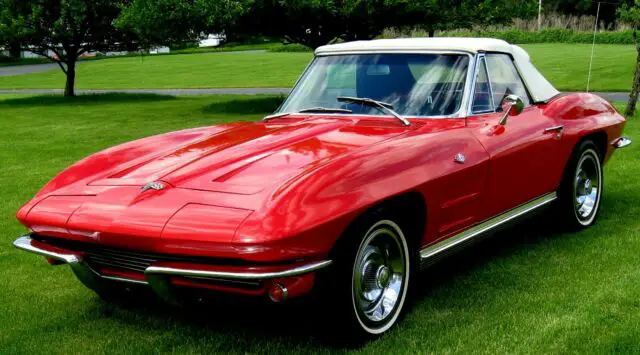 1964 stingray roadster,red/black,283,4spd,pb,white top,radials,beautiful driver!
