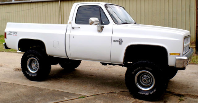 1985 chevy 4x4 truck frame off 454 big block 35's 6" lift new tires interior etc