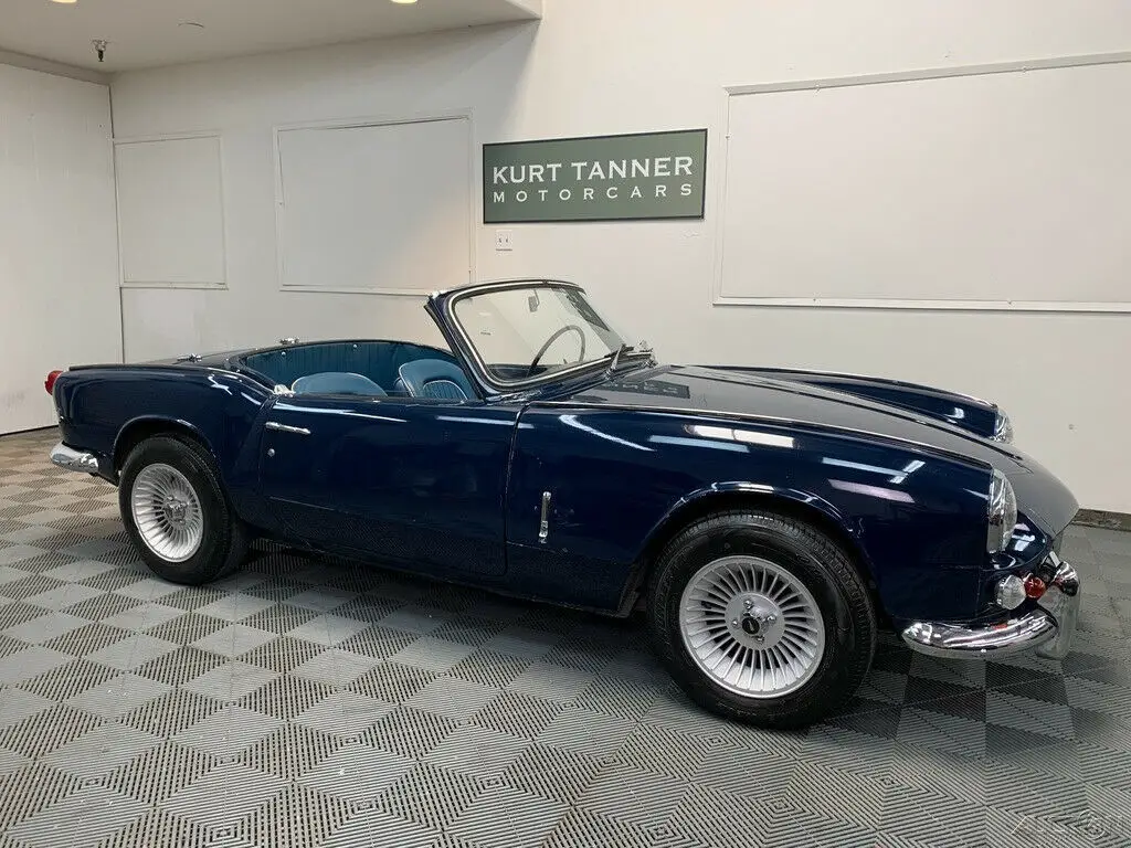 1966 triumph spitfire mk2. 4-speed, alloys, white hardtop. well-preserved driver