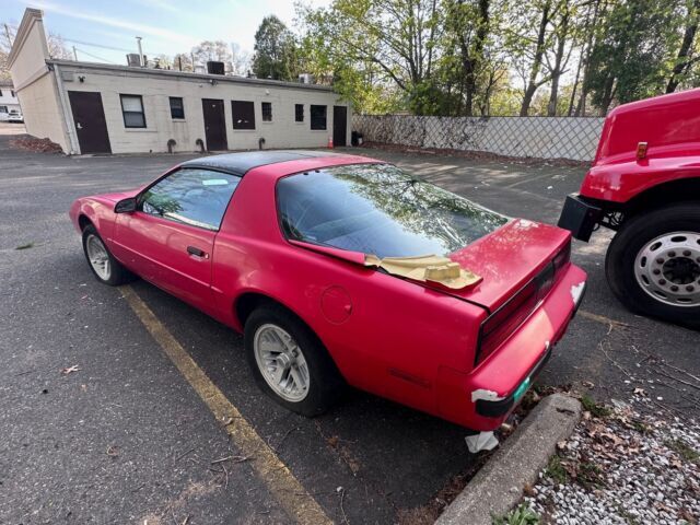 classic red 1991 pontiac firebird