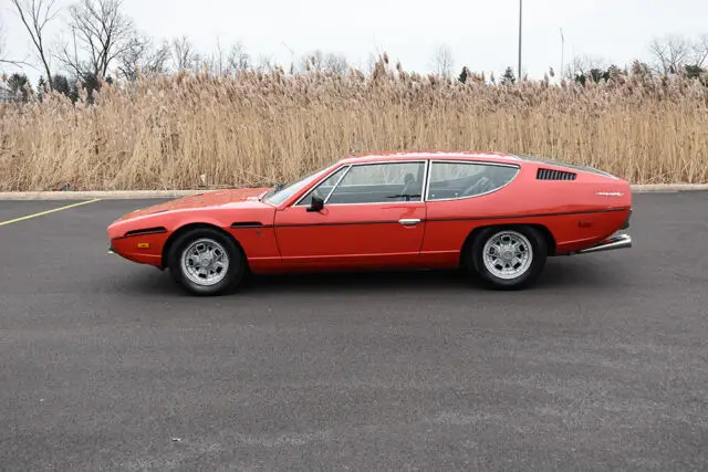extraordinary bertone design . 350hp bizzarrini v12 . sports car handling