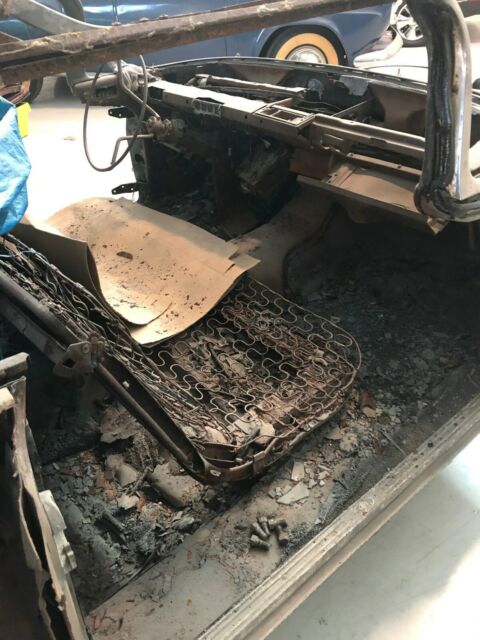 1960 buick burnt out convertible top iron in place, good running gear engine etc