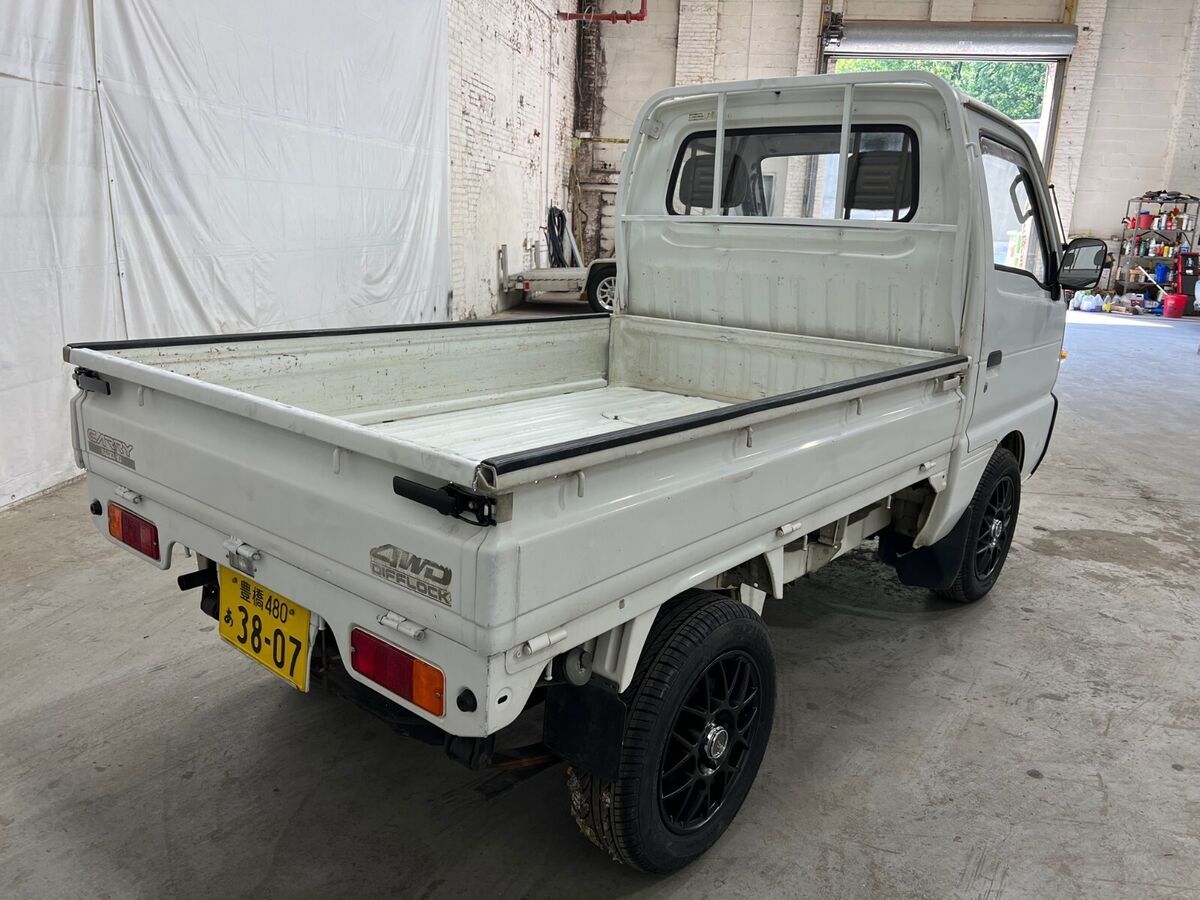 1993 suzuki carry 4x4 mini pickup diff lock an ac compare it 2 atv utv side/side