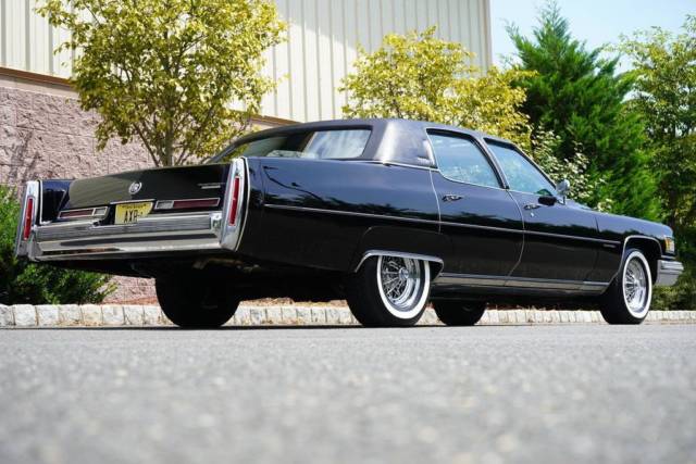 fleetwood brougham d'elegance triple black, fuel inj, astro roof, window sticker