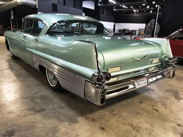 1957 cadillac fleetwood with kelsey hayes mag wheels