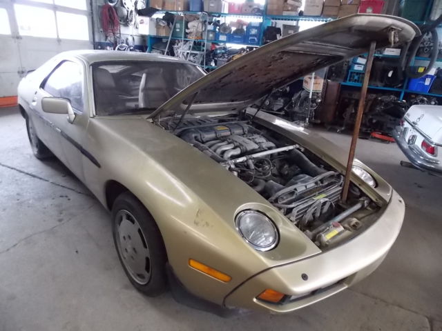 1982 porsche 928 gold/tan, 121,000 mi vin 2158 restoration project, 5 sp manual