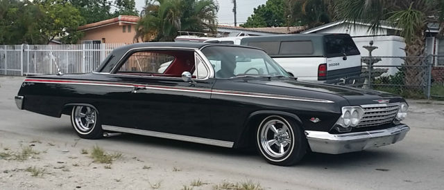 327 v8, black with red interior, lowered, supreme wheels