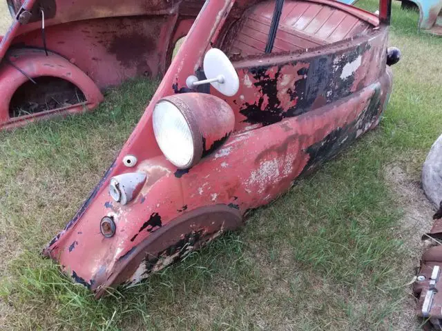 bmw isetta shell project with good roof and lights. sells for $30k restored