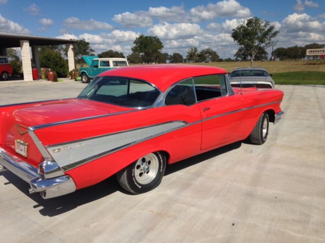57 chevy 4 speed, two four barrel carburetors very nice!!!