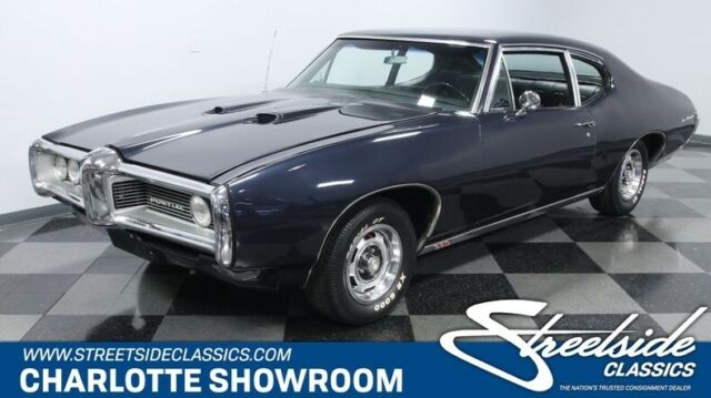 classic vintage chrome dark blue metallic black vinyl interior restored goat