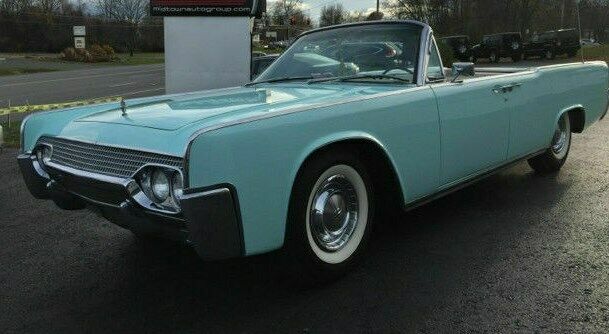 convertible top, suicide doors, air conditioning, leather. call 636-795-0772