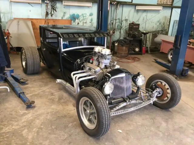 black 1927 t-model rat rod (with a little more "street rod" to it)