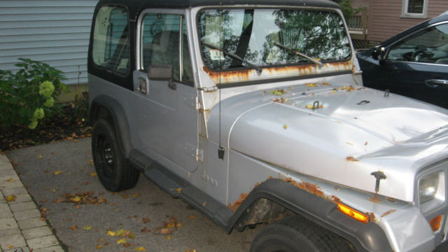 silver/gray 1987 jeep wrangler yj - used; needs some tlc