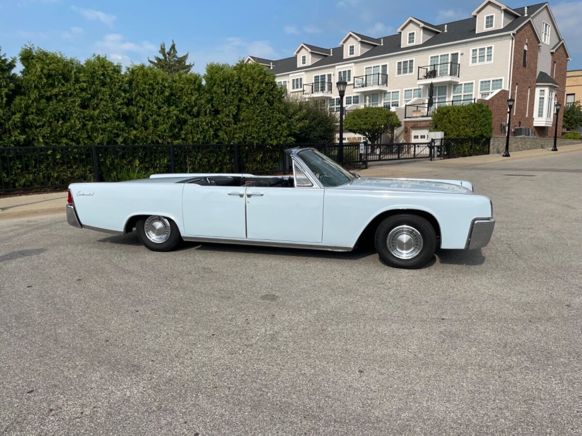1962 lincoln continental convertible, awesome driver, suicide doors