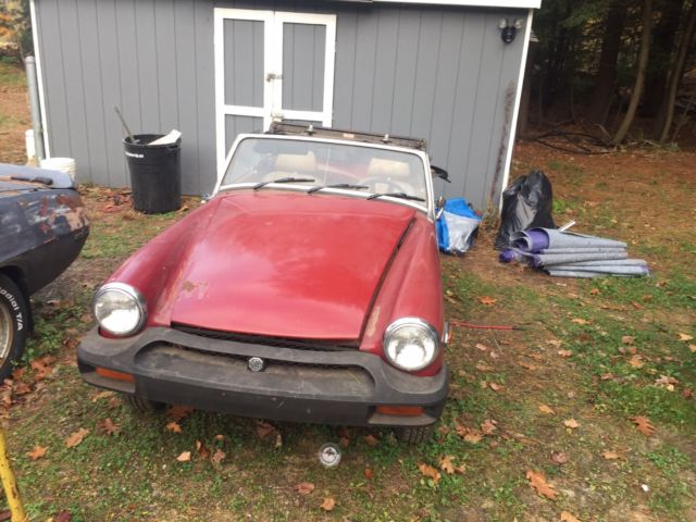 red convertible sports car manual