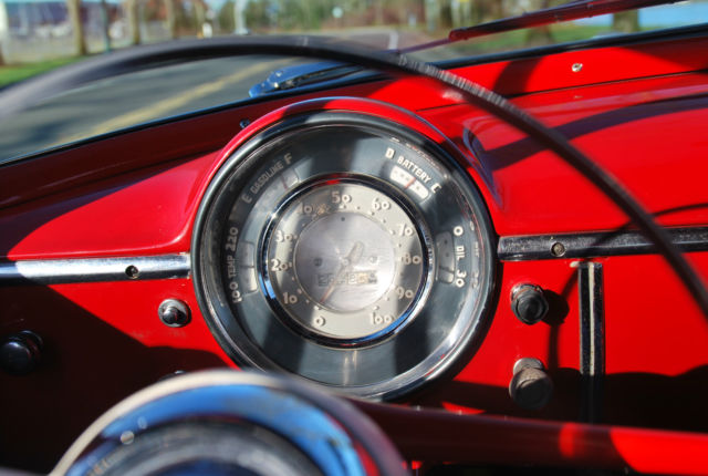 1950 chevrolet 2 door, red and white sedan