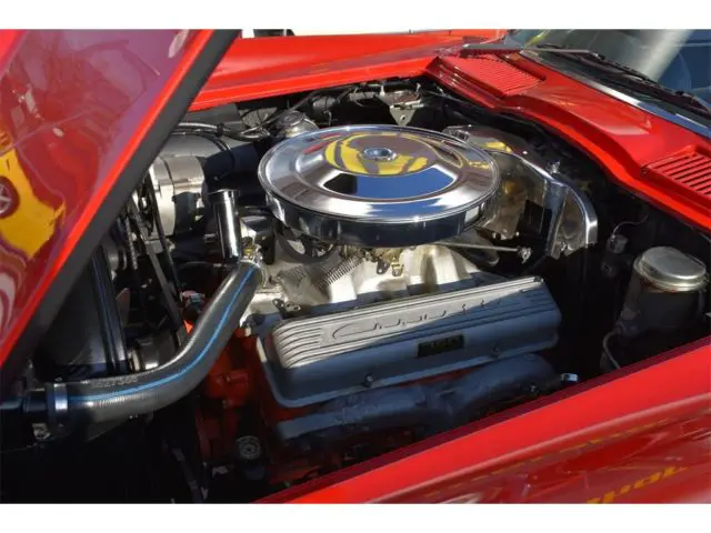 1965 chevrolet corvette, red/black, 4 speed, 350hp convertible