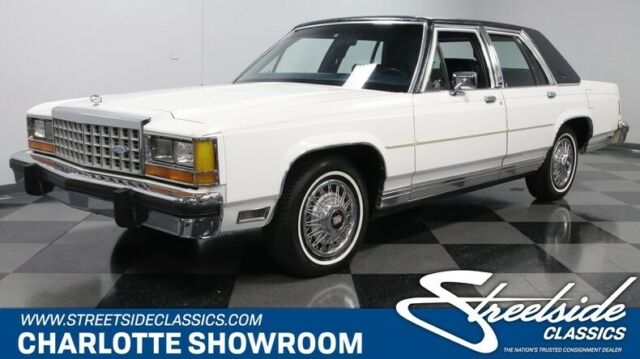 classic vintage chrome blue cloth interior fomoco wire hubcaps vinyl top