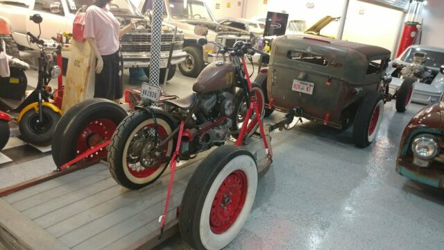 1928 model a rat rod with matching trailer and bike