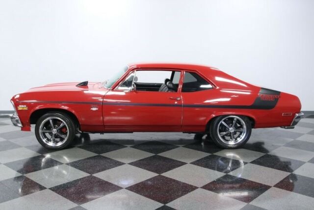 classic vintage chrome red black vinyl interior chevy sbc edelbrock stripes