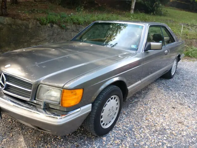 family owned since day 1 gray exterior with light tan interior less than 60k