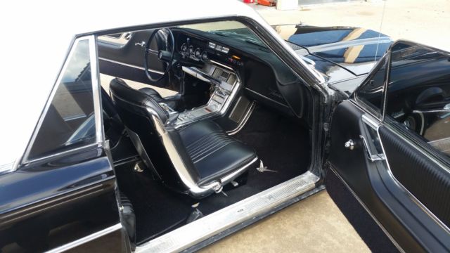 solid 1964 luxury ford thunderbird two tone black and white with