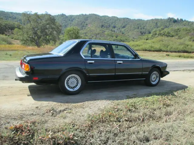 1985 bmw 735i clean and straight black on black 5 speed stick recent work done