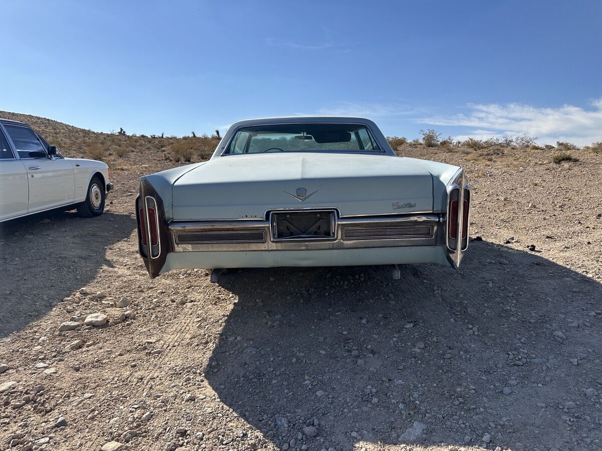 1966 cadillac deville coupe blue