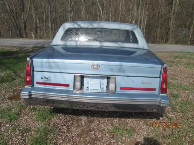 this is a 1986 cadillac coupe deville survivor