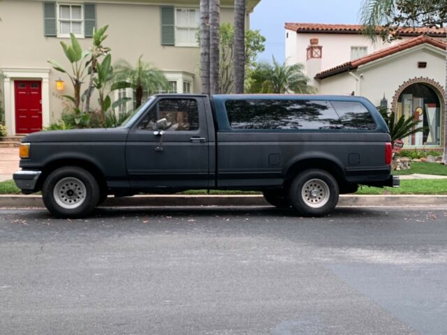 1990 ford f-150 4.9 straight-6 w/ manual 5-speed transmission & leer campershell