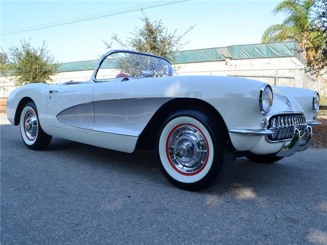 1957 vette, 283/270hp, 9,491 miles, polo white, silver coves, red interior