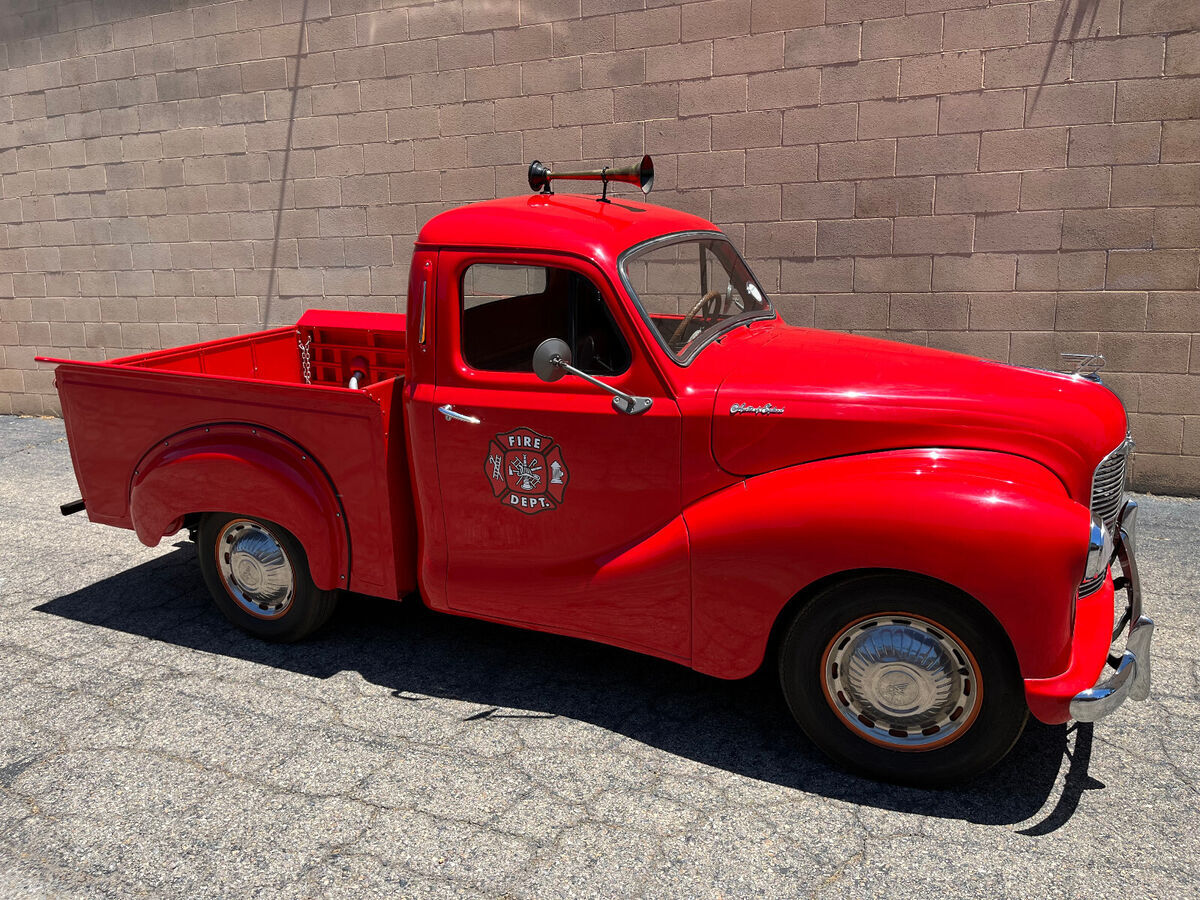 austin a-40 devon pickup truck before morris minor merger red vintage fire truck