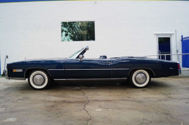 1975 - rare 'commodore blue metallic' color with matching leather interior!