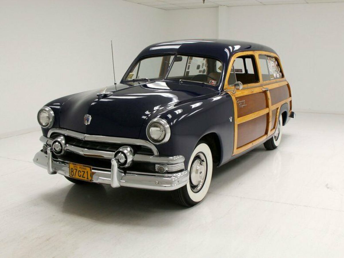 sheridan blue respray/mercury 239ci v8/original wood panels show nicely