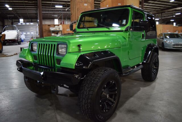 1991 wrangler renegade with 156601 miles, green manual straight 6 cylinder engi