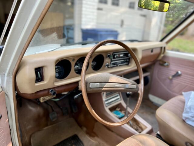 1979 datsun truck. 4 cylinder straight gear with factory dual wheels