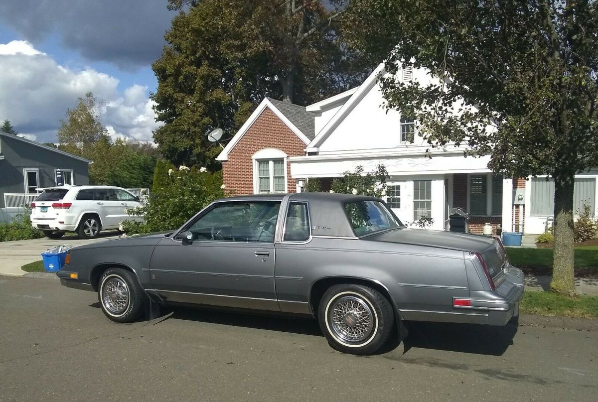 1987 oldsmobile cutlass brougham 2-dr- very low miles!