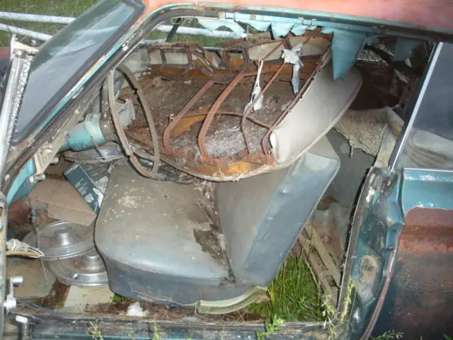 a pair of 1965 dodge coronet cars