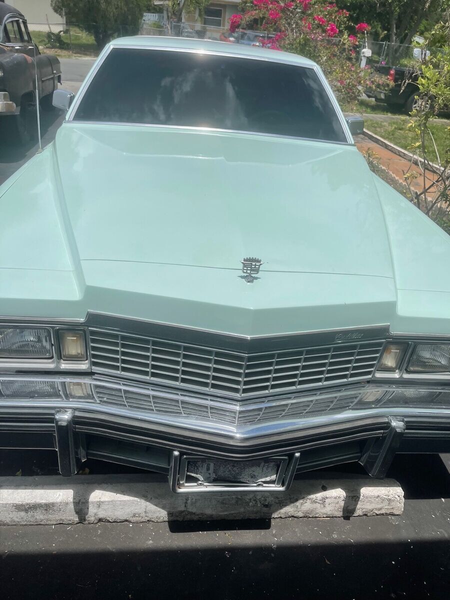 1977 cadillac de ville coupe green green