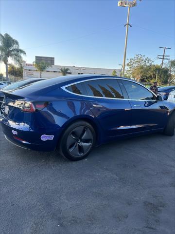 2019 tesla model 3 mid range