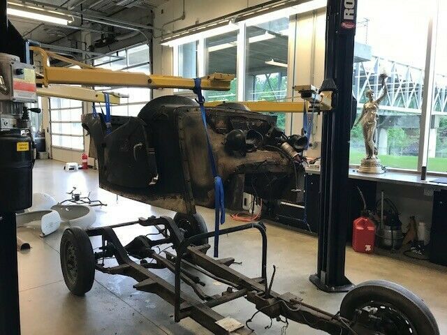 rolling chassis. no engine or transmission. very little rust
