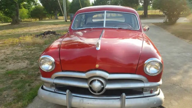 1950 4 door ford deluxe car