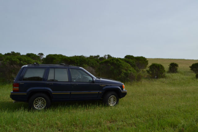 1994 beautiful dk blu jeep grand cherokee - no rust, 2 sets/new tires, new a/c
