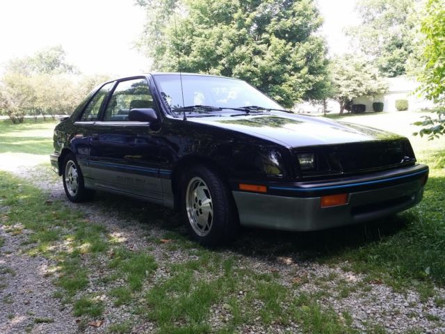 black and silver 1987 dodge shelby csx turbo 5 speed numbered car and signed