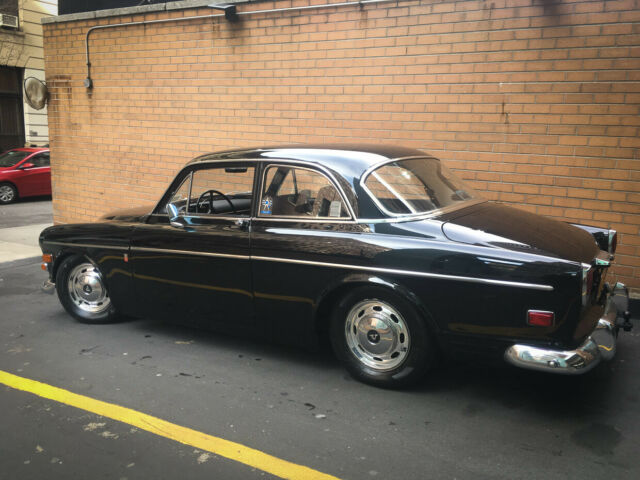 1968 volvo 122s - perfectly restored - custom black and sisal interior - no rust