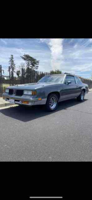 1987 oldsmobile cutlass supreme coupe grey rwd automatic